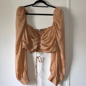 Peach color going out crop long sleeve top. Top is a 1XL from shop MissLola.